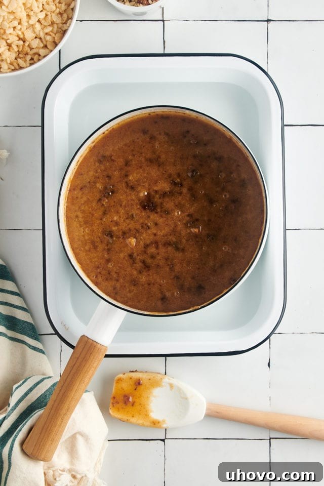 Overhead view of the saucepan containing date mixture cooling in a larger pan of cold water