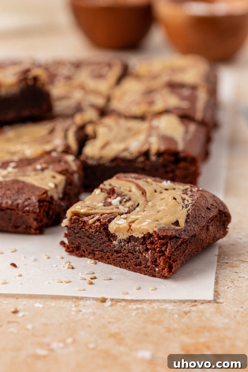 tahini brownies on parchment paper