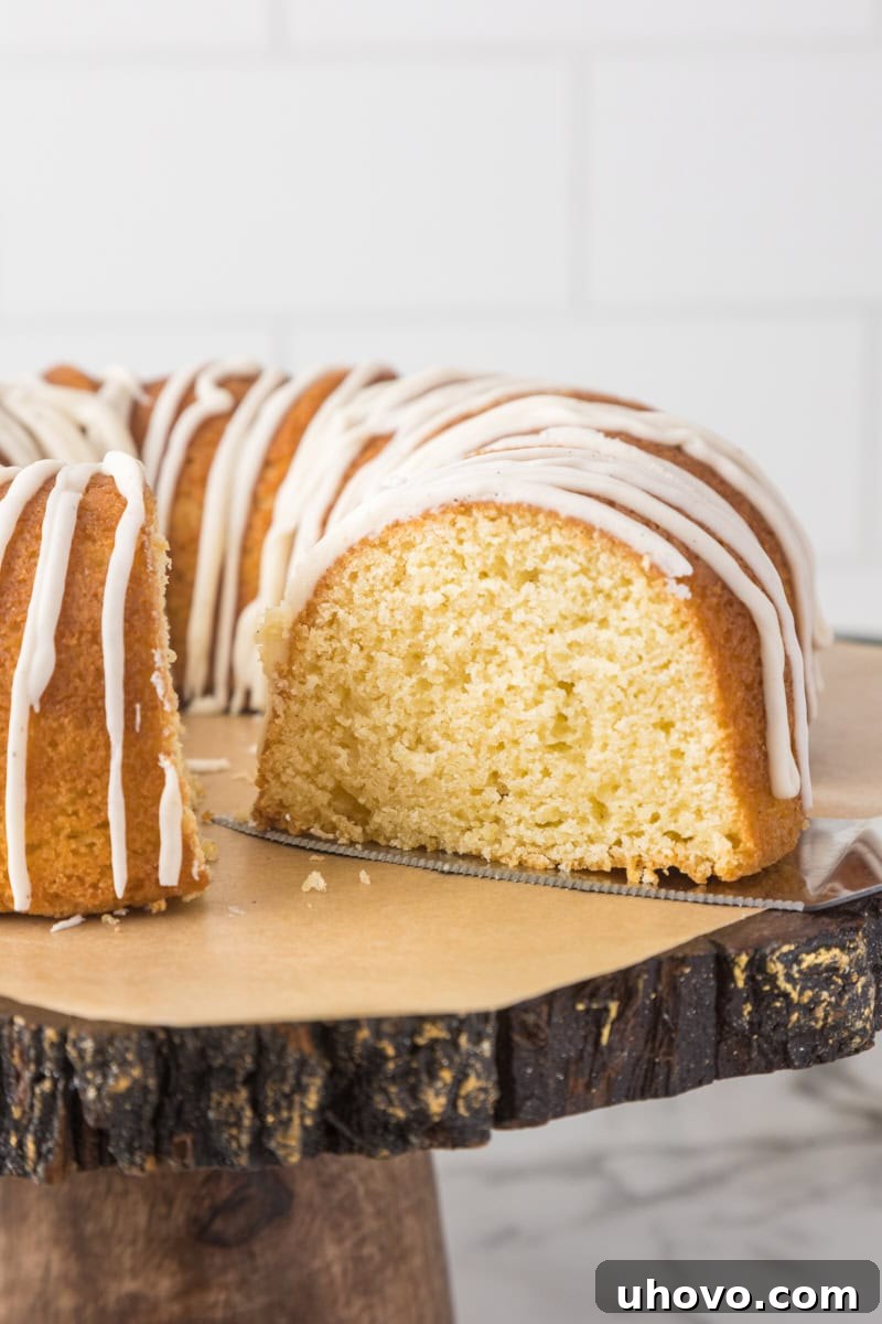 Sliced vanilla Bundt cake showing a light, tender crumb