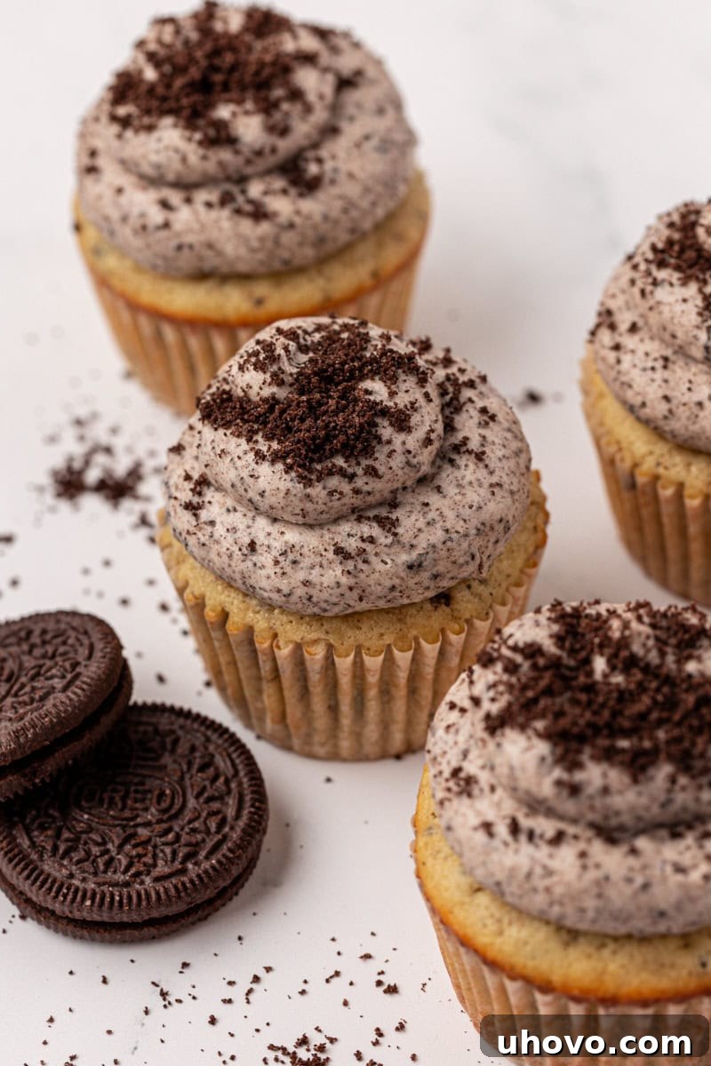 cookies and cream cupcakes topped with Oreo buttercream and cookie crumbs