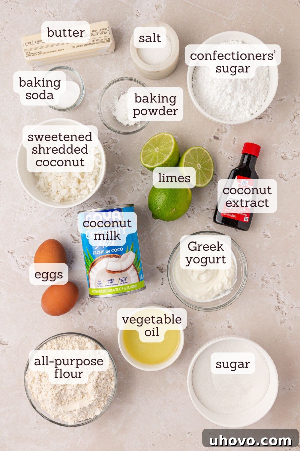 Overhead view of ingredients for coconut lime loaf cake laid out on a surface