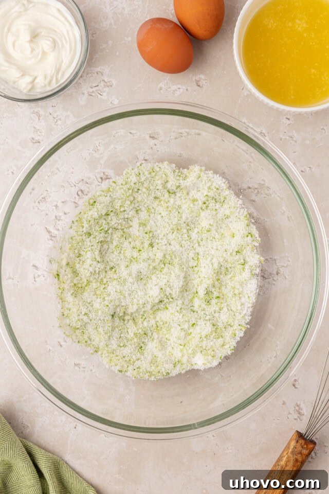 Lime zest rubbed into sugar for coconut lime loaf cake