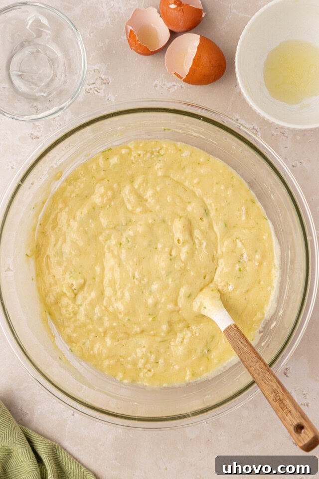 Coconut lime loaf cake batter in a mixing bowl