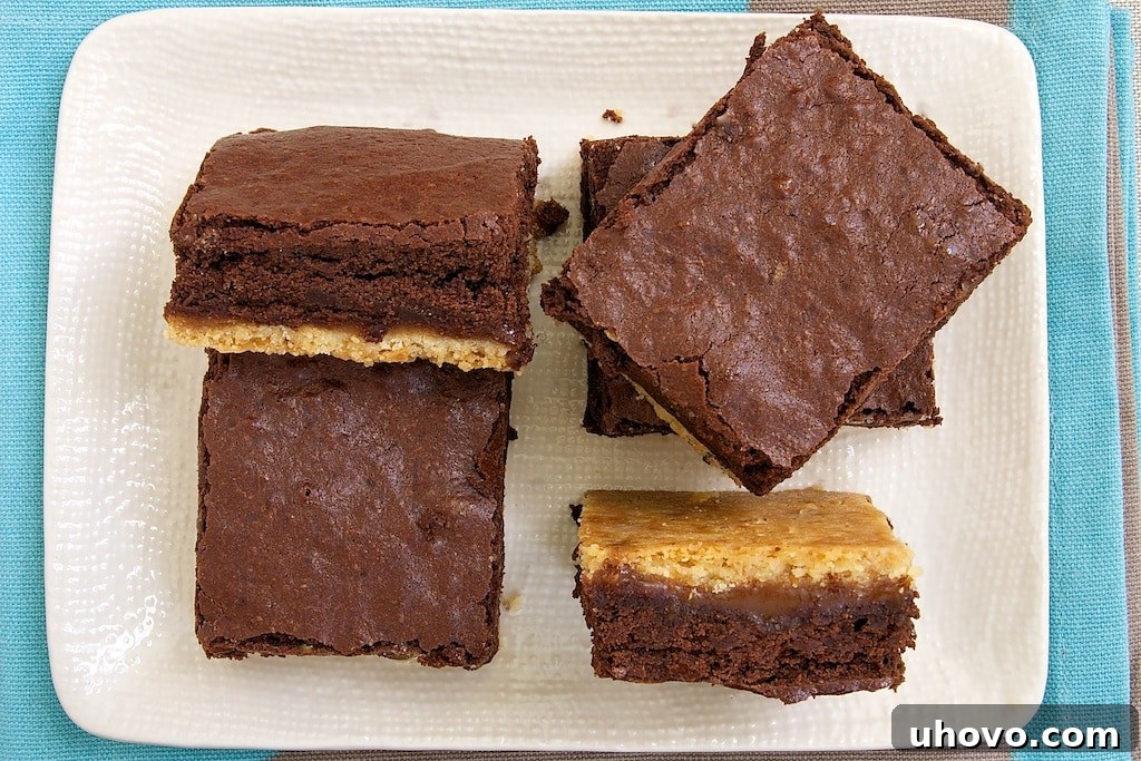 Caramel Popcorn Shortbread Brownies feature rich brownies, a thick caramel layer, and a unique crust flavored with crushed caramel popcorn.