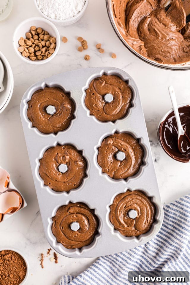 mini Bundt pan filled with chocolate cake batter