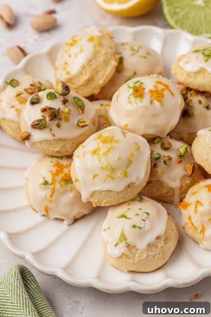 glazed lemon ricotta cookies served on a white plate
