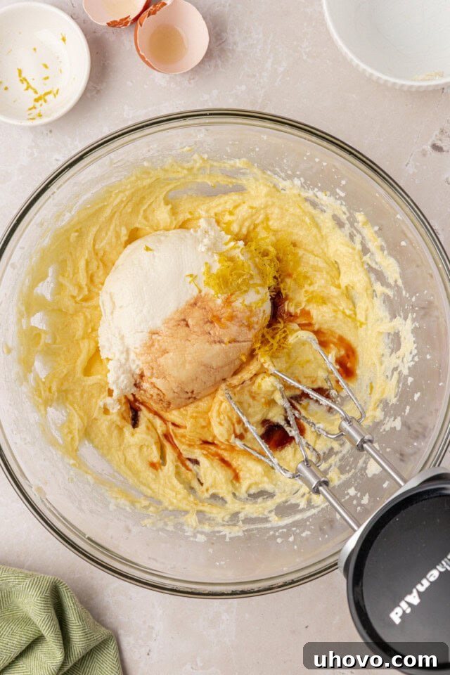 ricotta and extracts added to creamed butter mixture