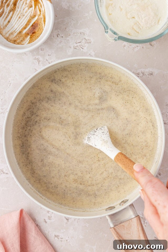 Heat cream, milk, sugar, and vanilla in a saucepan