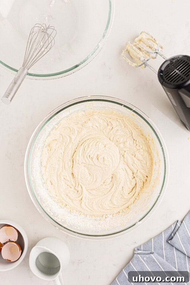 vanilla cake batter in a mixing bowl