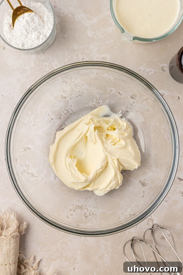 lightly whipped mascarpone cheese in a mixing bowl