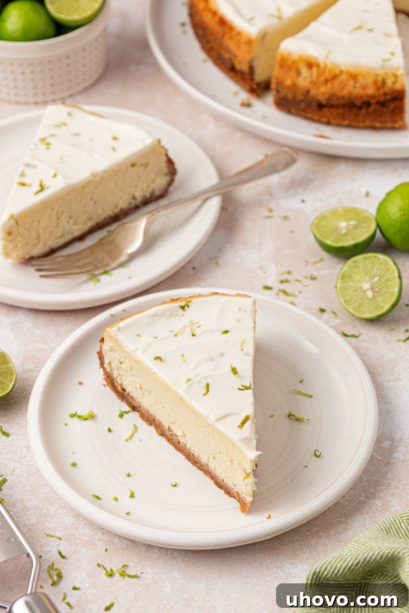 Creamy Key Lime Cheesecake Recipe: Zesty No-Bake Dessert 9 slices of Key lime cheesecake on plates with more cheesecake and limes in the background