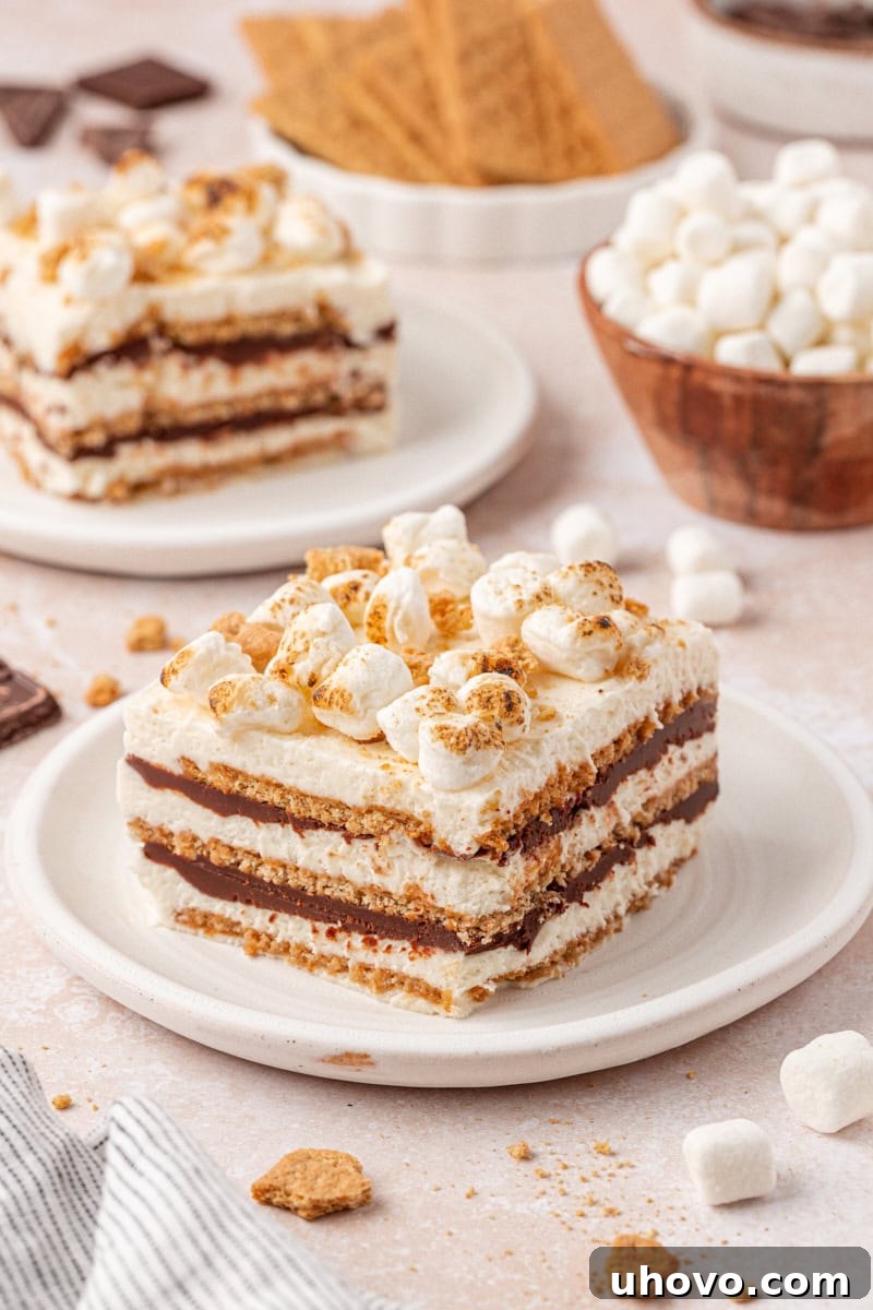 No-Bake S'mores Icebox Cake 9 s'mores icebox cake served on white plates