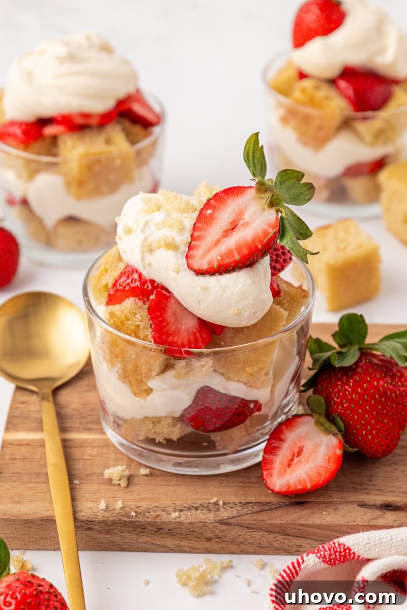 Mini Strawberry Shortcake Jars Recipe 12 a strawberry shortcake jar with vanilla cake cubes, whipped cream, and macerated strawberries