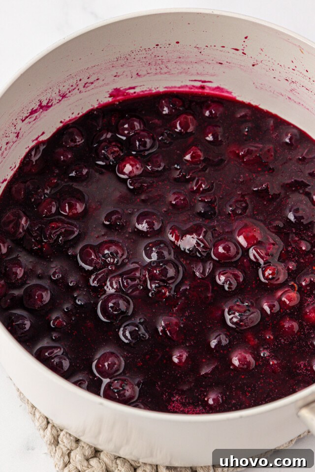 Creamy Blueberry Fool: Classic British Dessert Recipe 4 cooked blueberry mixture in a saucepan