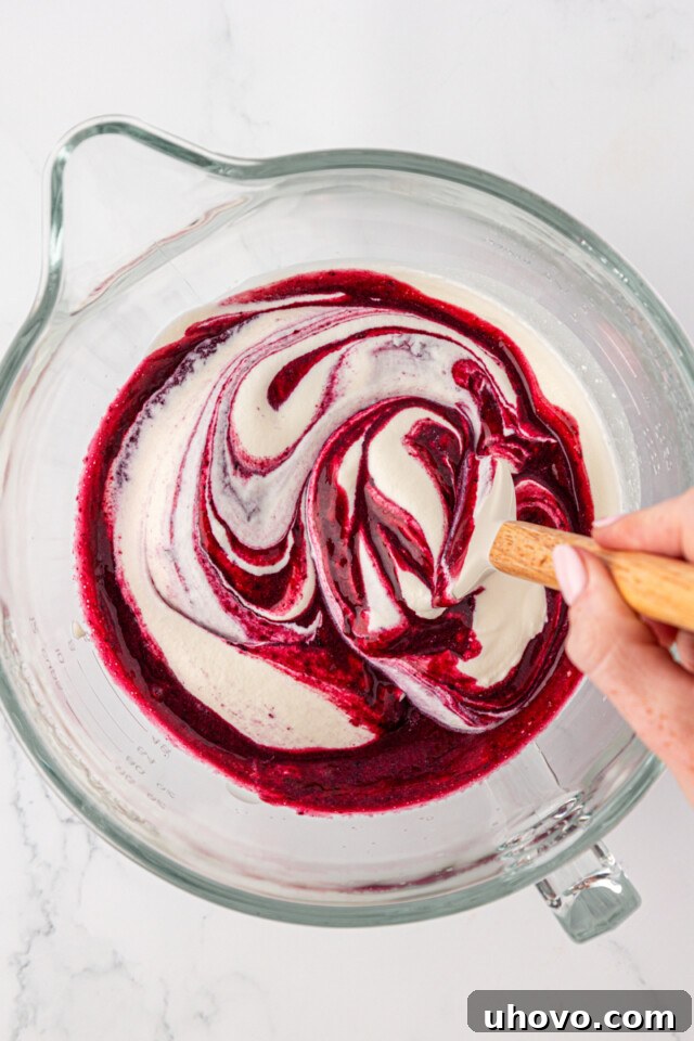 Creamy Blueberry Fool: Classic British Dessert Recipe 7 folding blueberry puree into whipped cream