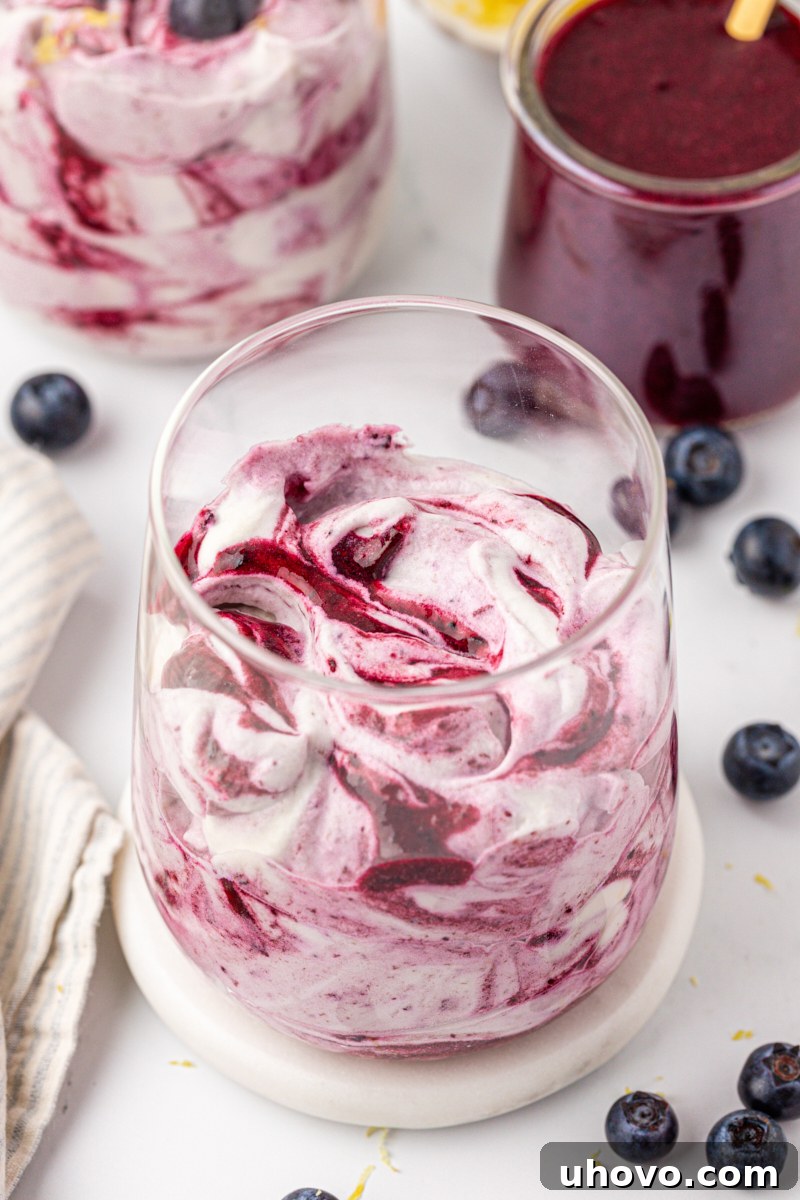 Creamy Blueberry Fool: Classic British Dessert Recipe 8 swirled blueberry fool served in a glass