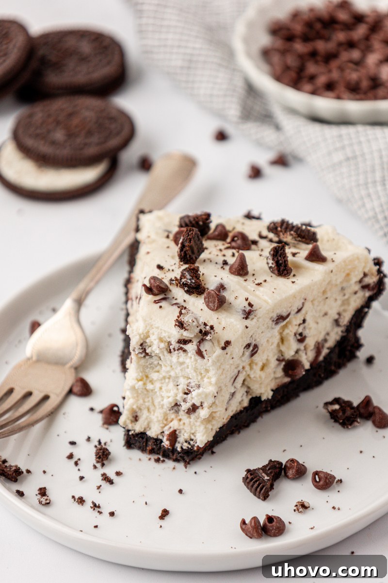 No-Bake Chocolate Chip Icebox Pie Recipe 2 a slice of chocolate chip icebox pie with Oreo cookie crust
