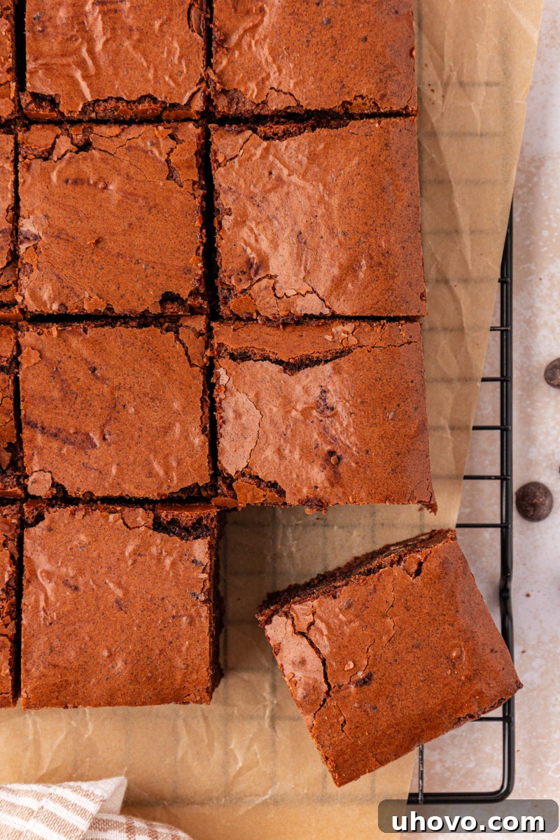 Fudgy Brownies Made with Brown Butter 8 overhead view of sliced brown butter brownies on parchment paper