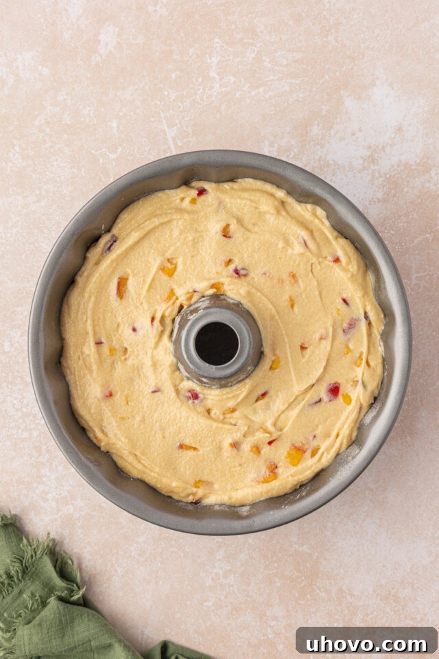 Peach Pound Cake Recipe with Fresh Peaches 6 peach pound cake in a Bundt pan before baking