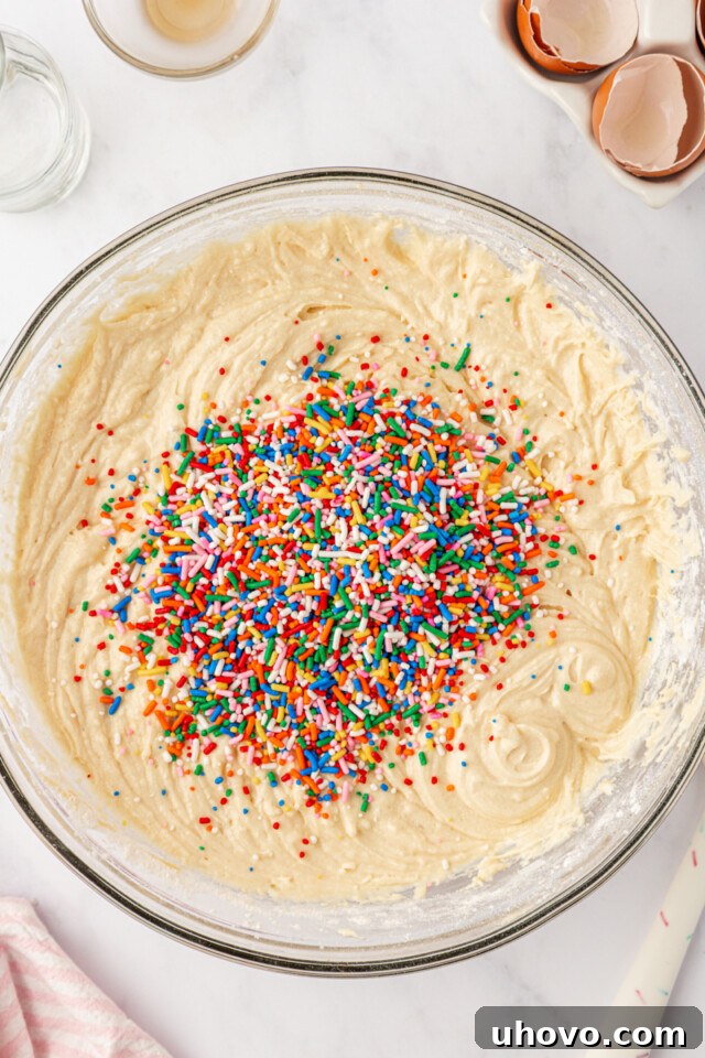 Party-Ready Funfetti Sheet Cake Recipe 5 sprinkles added to vanilla cake batter