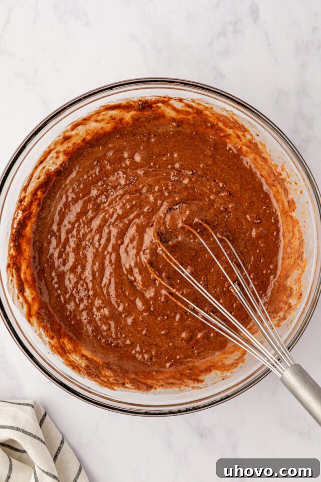 Homemade Chocolate Peanut Butter Swirl Muffins 5 chocolate muffin batter in a mixing bowl