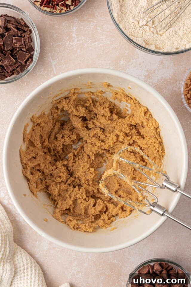 Gooey Loaded Chocolate Chip Cookies 4 creamed butter and brown sugar in a mixing bowl