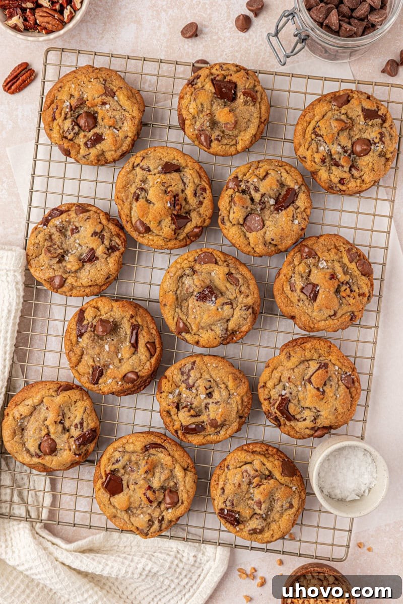 Gooey Loaded Chocolate Chip Cookies 8 overhead view of bakery-style loaded chocolate chip cookies cooling on a wire rack
