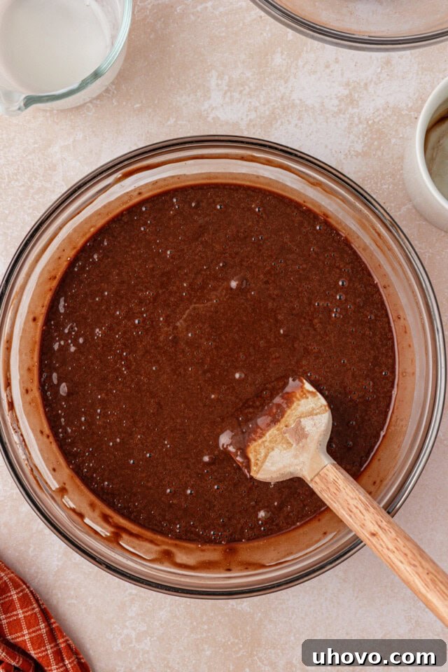 Decadent Chocolate Peanut Butter Cupcakes 4 chocolate cupcake batter in a glass mixing bowl