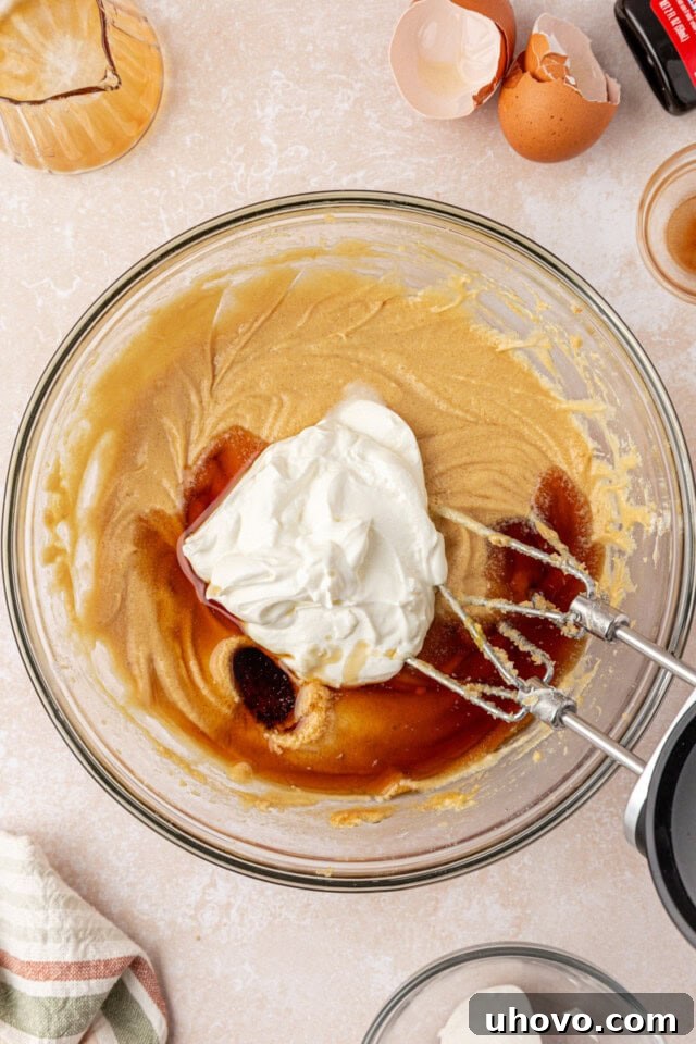 maple syrup and sour cream added to cake batter