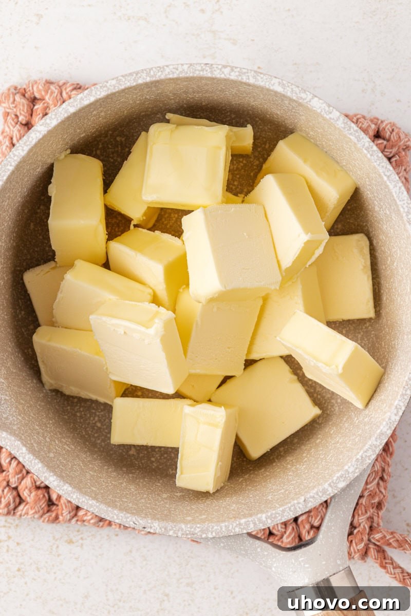 slices of butter in a saucepan